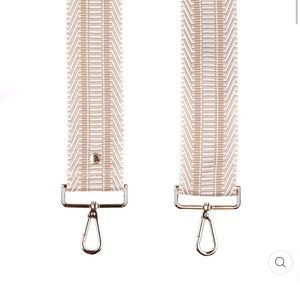 Pom Pom London purse strap.